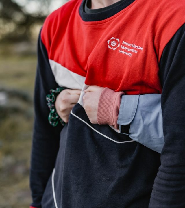 Photo by Sincerely Media man in black and red long sleeve shirt